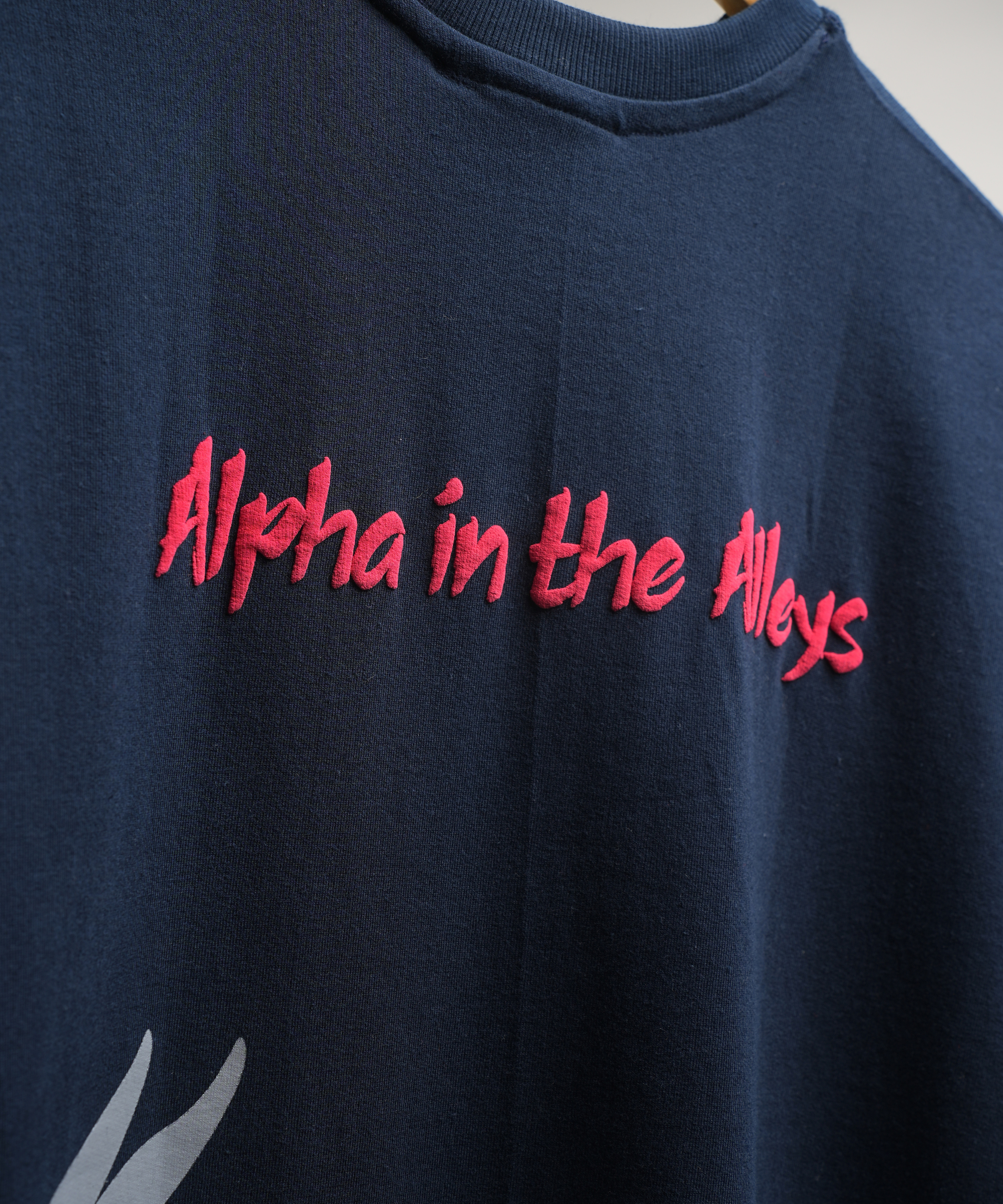 ALPHA IN THE ALLEYS- OVERSIZED TEE